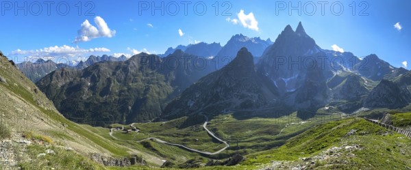 Panoramic view Panoramic photo with view of Italian southern ramp southern ascent mountain road alpine road to pass in the Alps alpine pass above tree line Colle di Gran San Bernardo, Col du Grand Saint Bernard, Great Saint Bernard Pass, Saint-Rhémy-en-Bosses, Italy