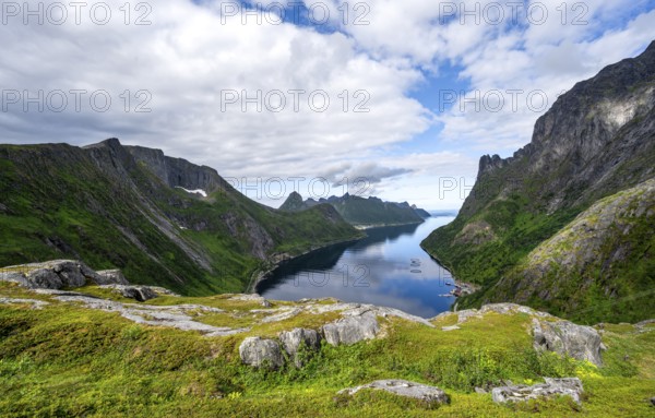 View of Øyfjorden fjord and mountains, fjord landscape with mountain peaks, hike to Barden mountain, Senja, Norway