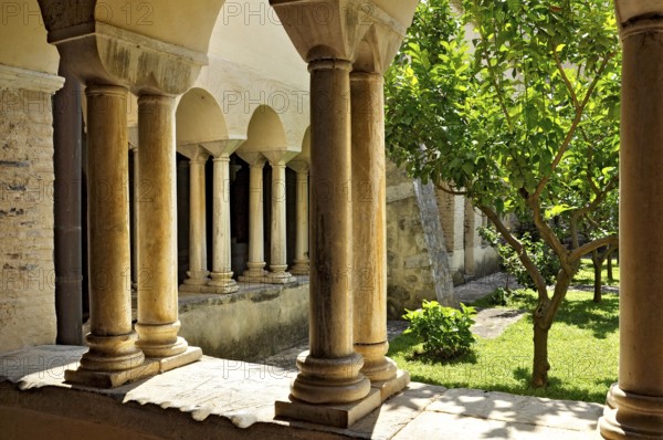Romanesque columns, double columns in the cloister, Gothic basilica of the Cistercian Abbey of Fossanova, Cistercian-Burgundian architectural style, Priverno, Province of Latina, Lazio, Italy