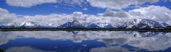 Mountain lake with alpine panorama, snow pond Finkenberg, Penken, Mayrhofen, Zillertal, Tyrol, Austria
