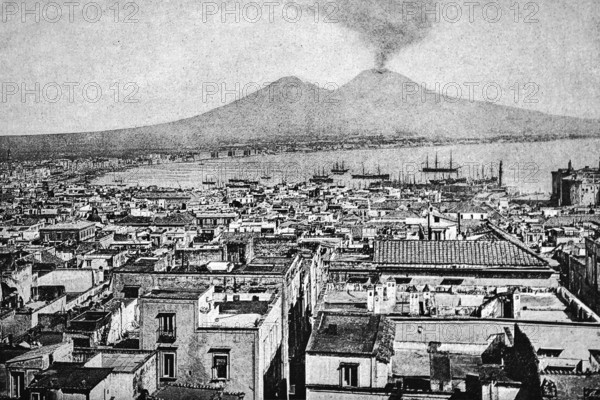 Cityscape of Naples with the smoking Vesuvius volcano, Gulf of Naples with sailing ships at anchor, Italy, historical illustration 1896