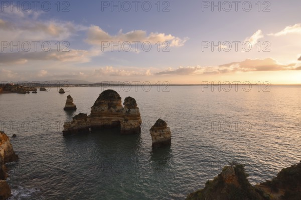 Rocky coast at sunrise, Praia do Camilo, Lagos, Algarve, Portugal