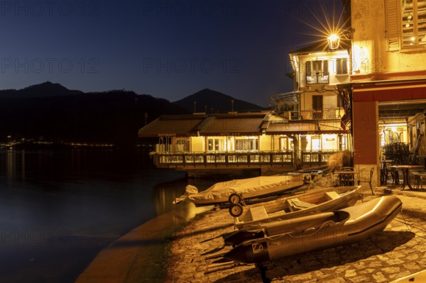 Cafe with fishing boats, Orta San Giulio, on Lake Orta, Province of Novara, Piedmont, Lago d'Orta, Italy