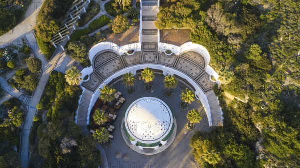 Drone shot, morning light, Symmetrical arrangement of buildings and gardens around a central dome, surrounded by palm trees and Mediterranean vegetation, Kalithea, Kallithea, thermal baths, spa, Rhodes, Dodecanese, Greek Islands, Greece