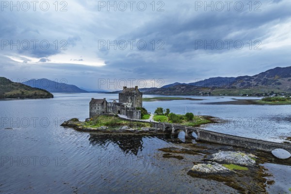 Eilean Donan Castle and Loch Duich from a drone, Isle of Skye, Highlands, Scotland, England, United Kingdom