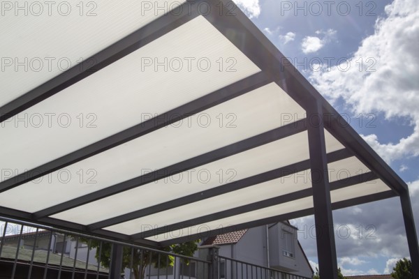 Aluminium terrace roofing on a residential building