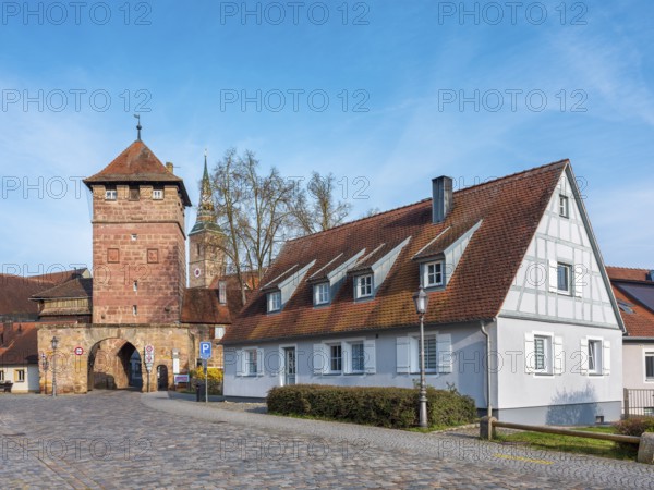 Alley with cobblestones leads through the town gate Unteres Tor, Wolframs-Eschenbach, Middle Franconia, Bavaria, Germany