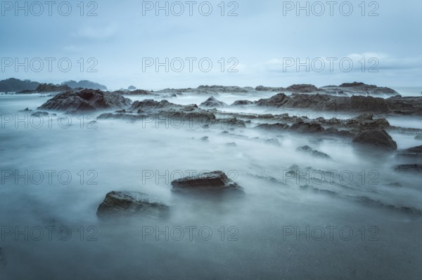 Cloudy weather meant a break from my ultralight photography on the Pacific Coast. I headed to my favorite beach near Dominical on Costa Rica's Pacific Coast hoping the sun would break through at the end of the day. It never did but the heavy overcast coupled with a 2 minute exposure (via the use of a 10 stop neutral density filter) made for an evocative image nonetheless