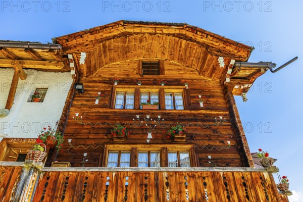 Parsonage, decorated with flowers, historic village centre, Grimentz, Val d'Anniviers, Valais Alps, Canton Valais, Switzerland