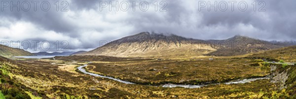 Panorama of Eas a' Bhradain waterfall, Red Cuillin mountains, Loch Ainort, Isle of Skye, Scotland, UK