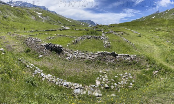 Foundation walls ruins of 2000 year old historical ancient Roman hostel Mansio at the top of the Alpine pass Colle del Piccolo San Bernardo, Col du Petit Saint Bernard Little Saint Bernard Pass in Alps, Aosta Valley region, Italy