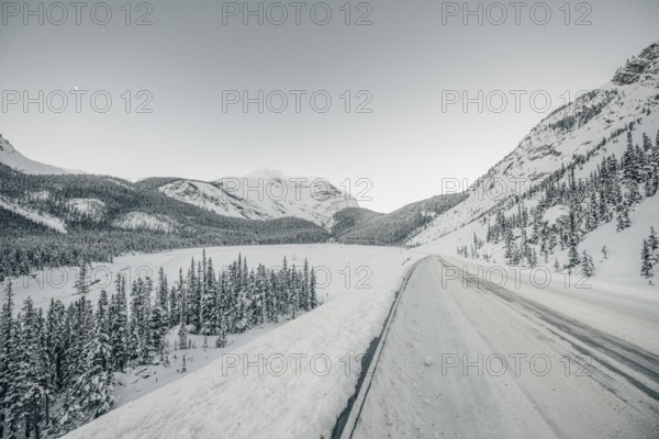 Winter road trip on the Icefields Parkway with lots of snow and ice, Banff National Park, Jasper National Park, Alberta, Canada