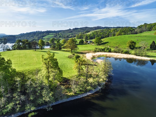 Farms over Esthwaite Water from drone, Lake District National Park, Cumbria, UK