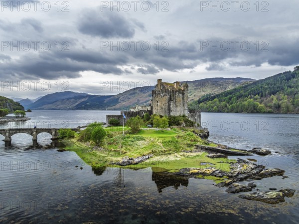 Eilean Donan Castle and Loch Duich from a drone, Isle of Skye, Highlands, Scotland, England, United Kingdom