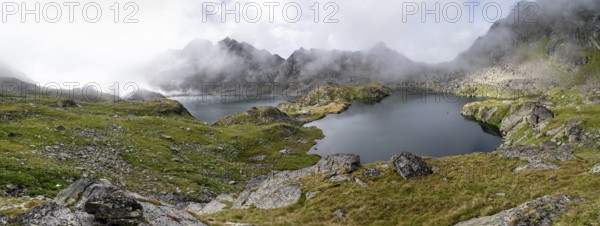 Mountain lakes Wangenitzsee and Kreuzsee, cloudy mountain peaks in the morning, Schober group, Hohe Tauern National Park, Carinthia, Austria