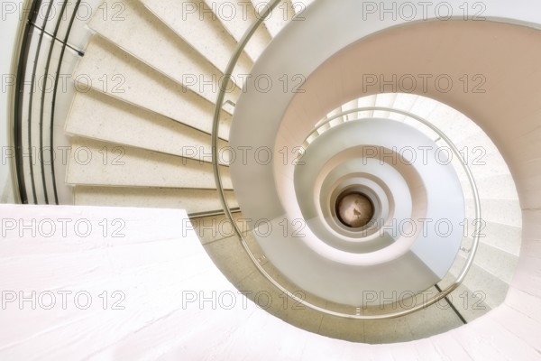 Modern white spiral staircase in an educational building, Zurich, Switzerland