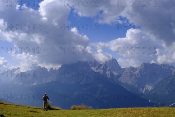 Mountaineer on the helmet, view of the Sesto sundial, Sesto, Dolomites, Val Pusteria, South Tyrol, Italy