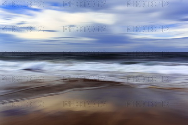 Skarðsvík Beach, surf waves on sandy beach, coastal landscape, evening sky, motion blur, Skardsvik, Snaefellsnes, West Iceland, Iceland