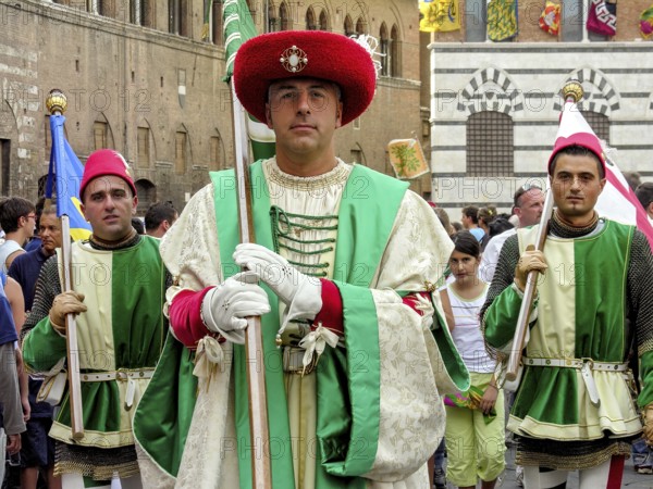 Il Palio di Siena, historical horse race, flag bearer of the Contrada dell Oca, goose, parade in costumes through the alleys, Passegiata storica, historic centre, Siena, Tuscany, Italy