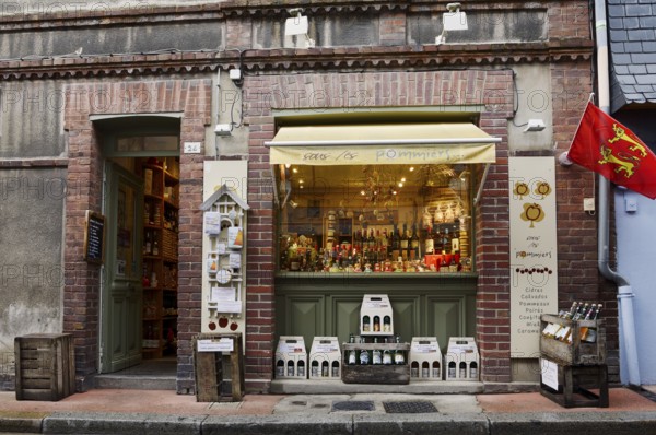 Entrance and shop window of a Calvados and cider shop, Vieux Bassin, Honfleur, Cote Fleurie, Pays d'Auge, Département Calvados, Normandy, France