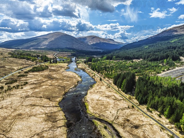 Mountains and Moors over Loch Tulla and River Orchy from a drone, Highlands, Scotland, UK