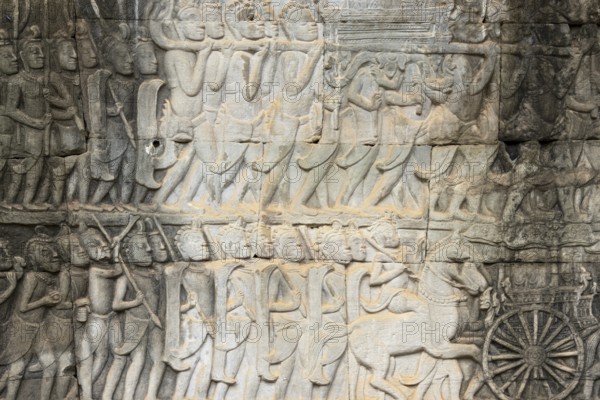 Stone bas-reliefs, Khmer war campaign against the Cham, relief wall, east façade, Bayon temple, Angkor Thom, Siem Reap province, Cambodia