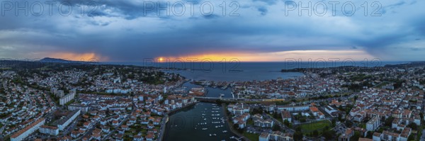 Panorama of Sunset over Saint-Jean-de-Luz from a drone, Nouvelle-Aquitaine, Pyrenees-Atlantiques, France