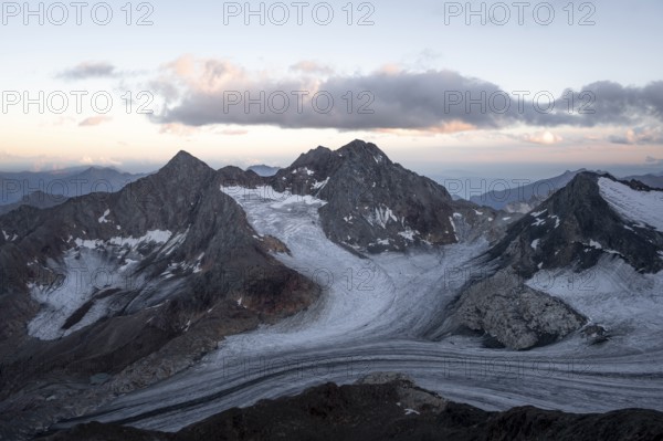 High mountain landscape at sunset, glacier and rocky mountain peaks, view of the Königshofspitz mountain peak and Übeltalferner glacier, Stubai Alps, South Tyrol, Italy