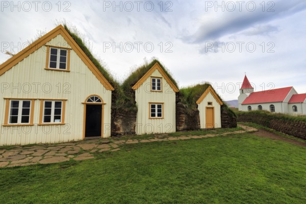 Grass sod houses and church, green roofs, peat farm or peat museum Glaumbaer or Glaumbær, open-air museum, Skagafjörður, Varmahlíð, Norðurland vestra, Northwest Iceland, Iceland