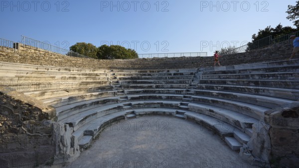 Ancient amphitheatre with massive stone steps and blue sky in the background, Ancient Theatre, Odeon, Kos Town, Kos, Dodecanese, Greek Islands, Greece