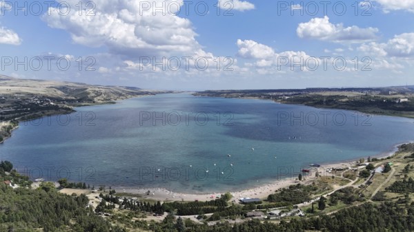 Aerial view of the Chronicle of Georgia with the Tbilisi Sea in the background