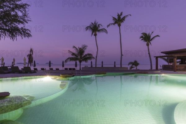 Illuminated swimming pool on the island of Koh Chang, Andaman Sea, Southern Thailand, Thailand