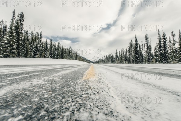 Winter road trip on the Icefields Parkway with lots of snow and ice, Banff National Park, Jasper National Park, Alberta, Canada