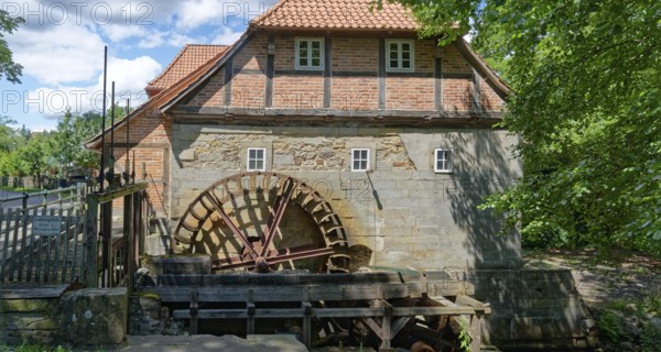 The Laderholz watermill, a technical monument, is located on the watercourse of the Alpe on the outskirts of Laderholz, a district of Neustadt am Rübenberge. The mill is driven by two water wheels. Laderholz, Neustadt am Rübenberge, Lower Saxony, Germany