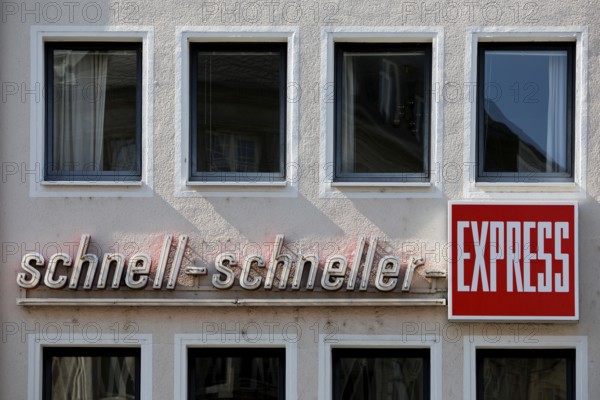 Writing on a wall of a house fast fast express, German newspaper, regional tabloid, Bonn, North Rhine-Westphalia, Germany