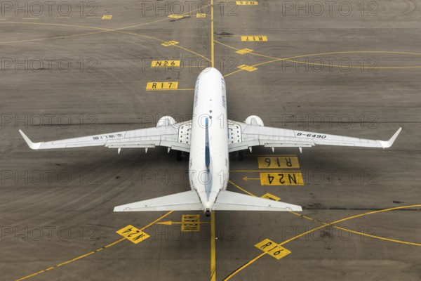 A Boeing 737-800 aircraft of Xiamenair with registration number B-6490 at Chek Lap Kok Airport (HKG) in Hong Kong, China