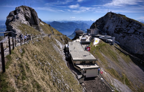 Pilatus Kulm mountain station, Hotel Bellevue, Hotel Pilatus Kulm, summit donkey, tourists, Canton of Lucerne, Switzerland