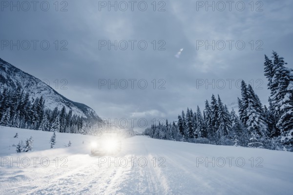 Winter road trip on the Icefields Parkway with lots of snow and ice, Banff National Park, Jasper National Park, Alberta, Canada