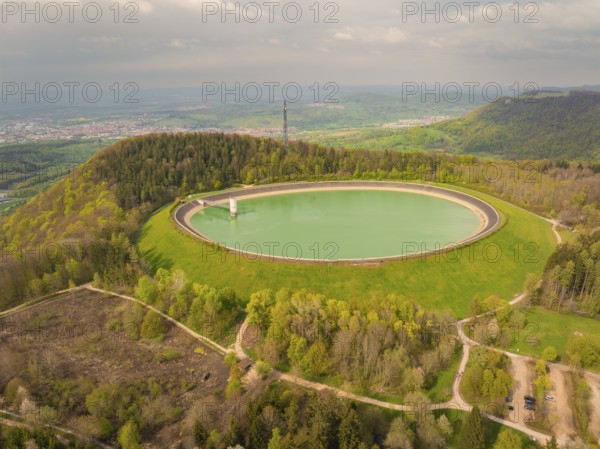 Upper reservoir, landscape with reservoir and forest on a hill, observation tower in the background, Glems reservoir, Swabian Alb, Germany