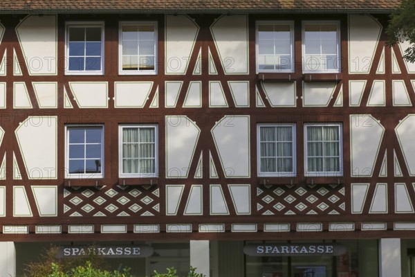 Half-timbered house, facade, savings bank, lettering, letters, mullioned window, Oberuhldingen district, Uhldingen-Mühlhofen municipality, Lake Constance district, Baden-Württemberg, Germany