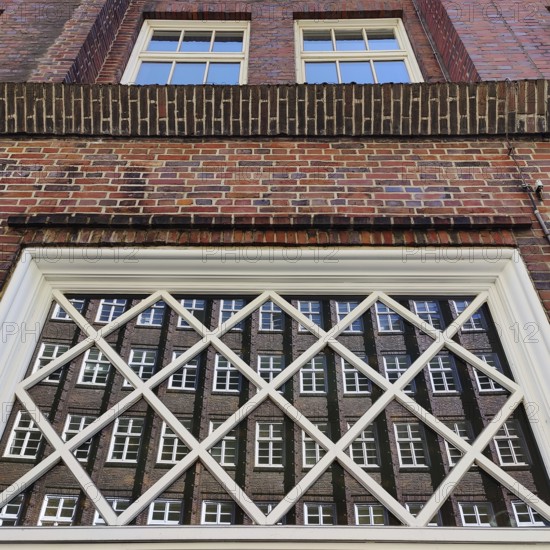Reflection of the façade of the Sprinkenhof, Brick Expressionism, Kontorhausviertel, UNESCO World Heritage Site, Hamburg, Germany