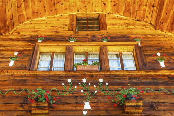 Parsonage, decorated with flowers, historic village centre, Grimentz, Val d'Anniviers, Valais Alps, Canton Valais, Switzerland