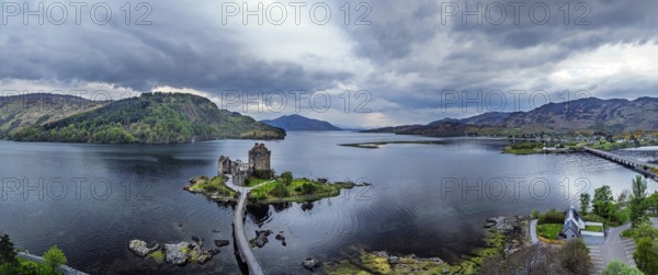 Panorama of Eilean Donan Castle and Loch Duich from a drone, Isle of Skye, Highlands, Scotland, England, United Kingdom