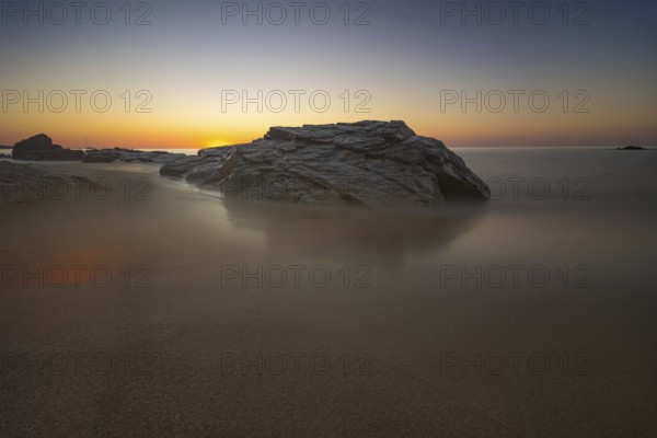 The sun rises on the Costa Rei, a stretch of coastline on the Italian Mediterranean island of Sardinia, Monte Nai, Costa Rei, Sardinia, Italy