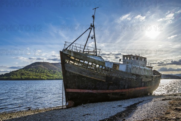 Corpach Wreck or Old Boat of Caol and Nevis Range Mountains, Caol Beach, Corpach, Fort William, Highland, Scotland, UK