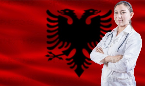 Female doctor on Albania flag. Doctor with crossed arms on Albania flag. Albania health and care concept