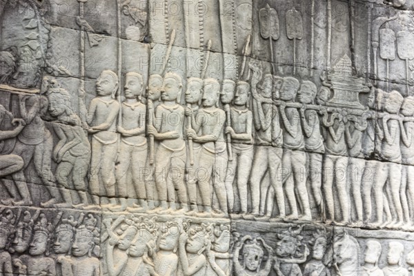Stone bas-reliefs, Khmer war campaign against the Cham, relief wall, east façade, Bayon temple, Angkor Thom, Siem Reap province, Cambodia