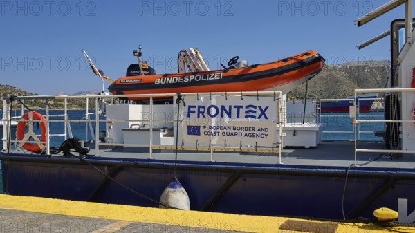 FRONTEX coast guard boat at the dock with orange dinghy on board, Lakki, Leros, Dodecanese, Greek Islands, Greece