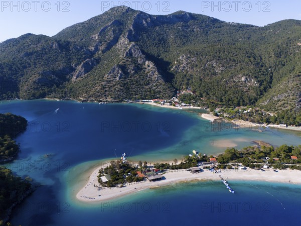 Panoramic picture with coastline and sandbank, surrounded by turquoise water and green hills, aerial view, Fethiye, Mugla, Mugla, Aegean Sea, Turkey