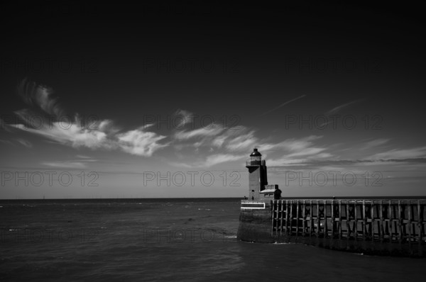 Sea, lighthouse Feu de la jetée Sud, lighthouse, black and white, harbour entrance, pier, Fécamp, Normandy, Seine-Maritime, France